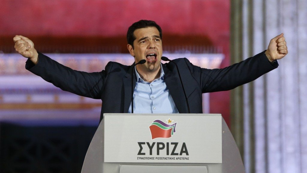 The head of radical leftist Syriza party Alexis Tsipras speaks to supporters after winning the elections in Athens January 25, 2015. Tsipras promised on Sunday that five years of austerity, "humiliation and suffering" imposed by international creditors were over after his Syriza party swept to victory in a snap election on Sunday. REUTERS/Marko Djurica (GREECE - Tags: POLITICS ELECTIONS) - RTR4MUZZ